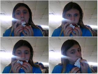 eating a ice cream sandwich at school