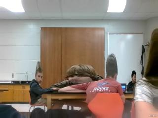 Colton and Sawyer at school with Benjamin in the back