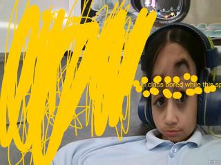 its say in class bored while this spashis teacher yells